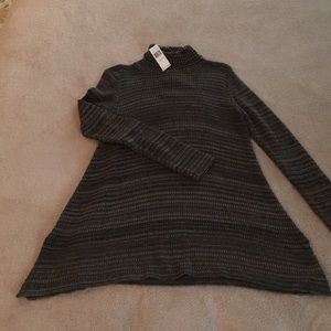 Long turtle neck sweater dress with side slits